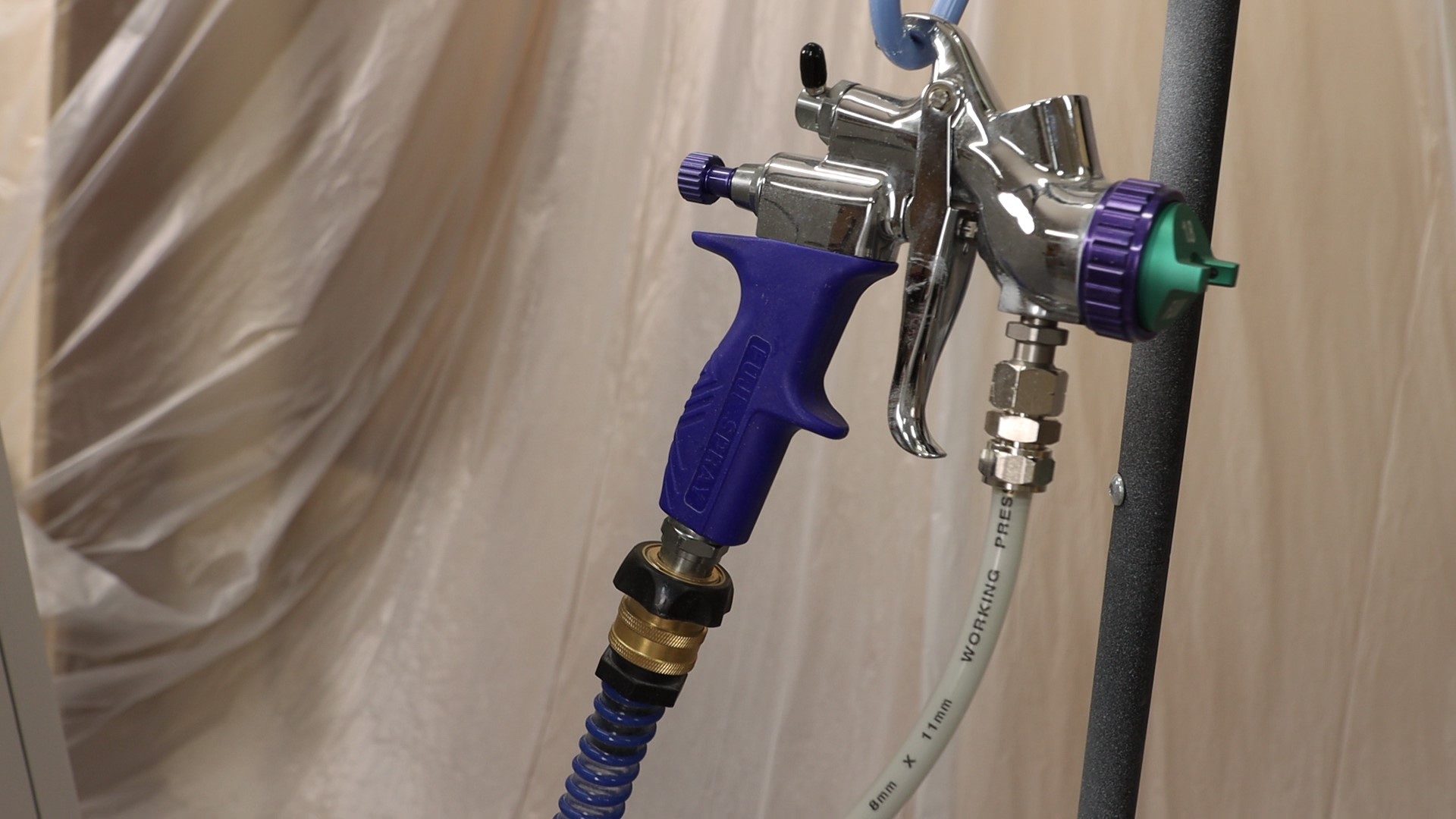Fuji Spray T70 being hung on a hook