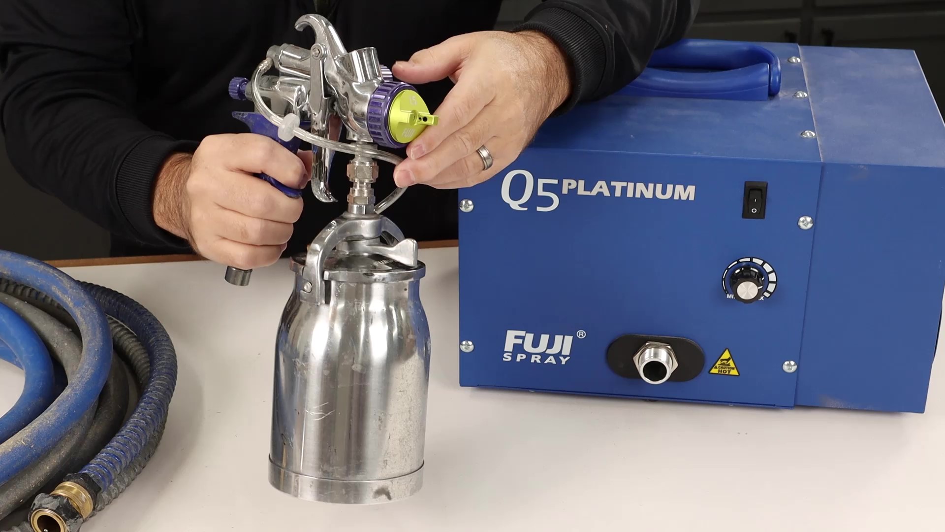 Q5 Platinum HVLP spray system with a T70 bottom feed spray gun