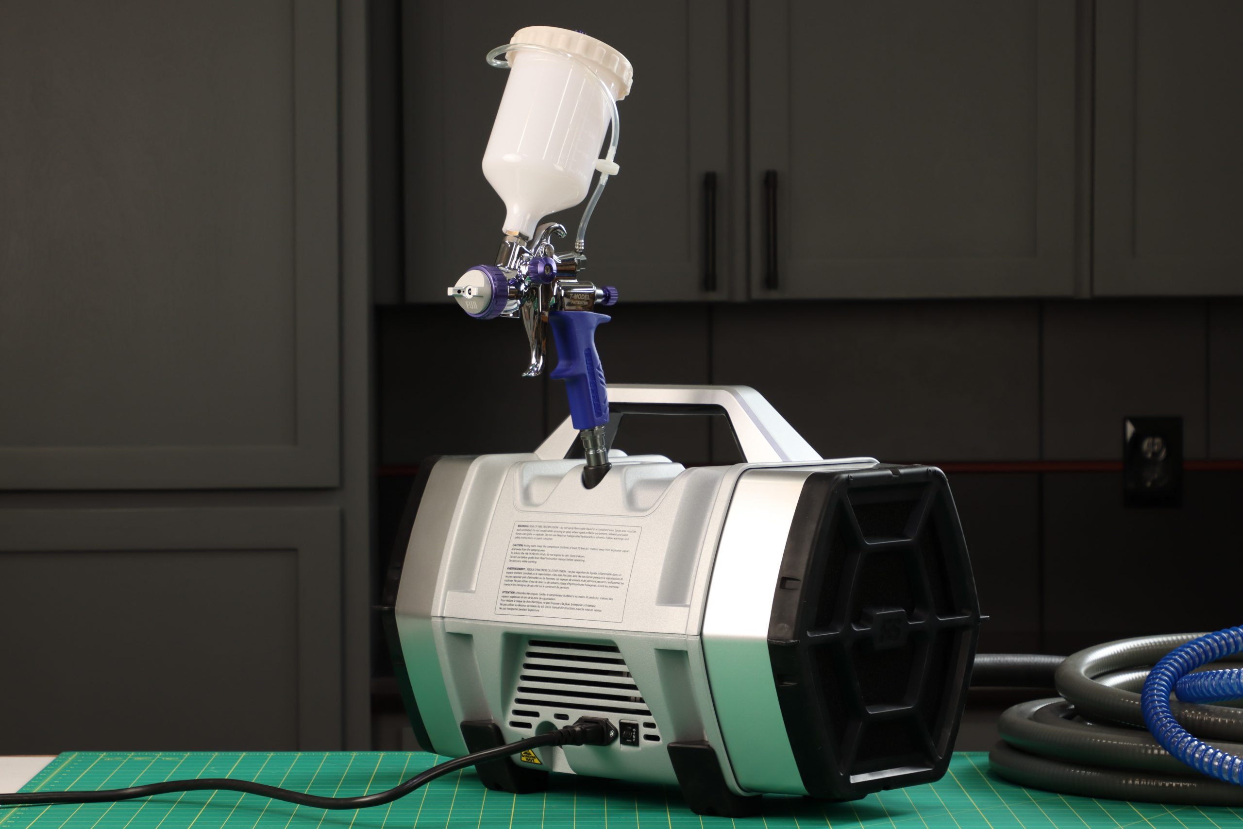 the retractable gun holder for gravity feed guns